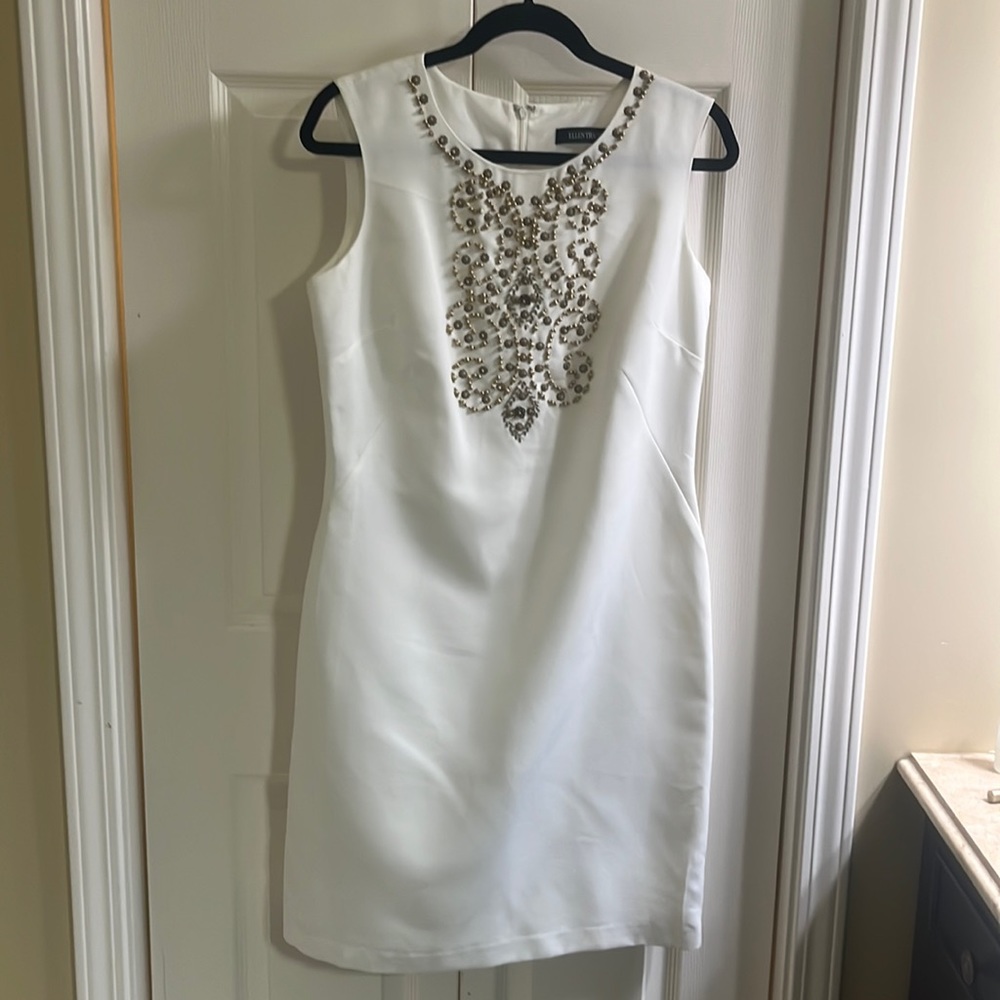 Women’s winter white dress.